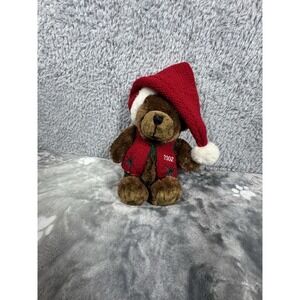 brown plush teddy bear with a Christmas theme